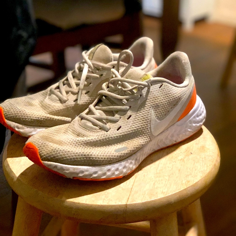 2 pairs Nike Revolution 5 platinum tint and black/red pair
